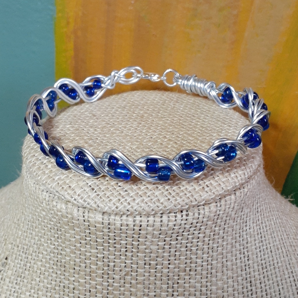 Blue beaded wire bangle bracelet